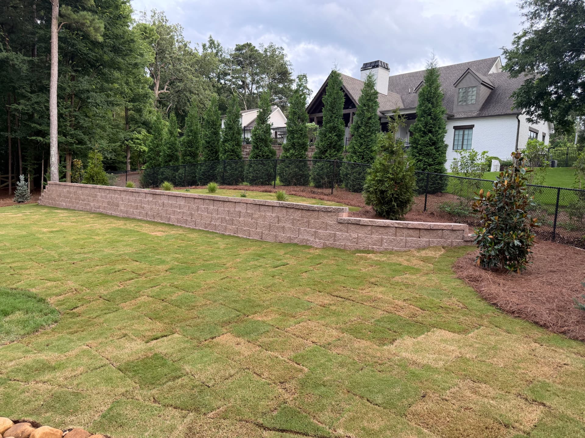 Stepped Retaining Wall & New Sod